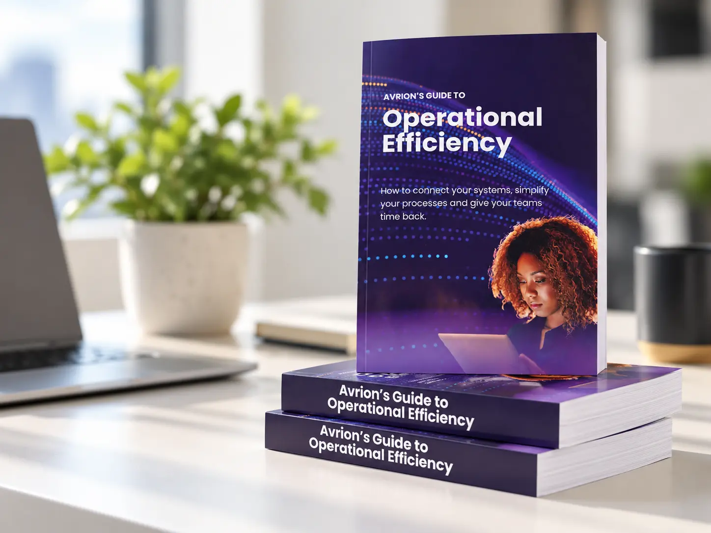 Avrion's Guide to Operational Efficiency, printed copies on a desk
