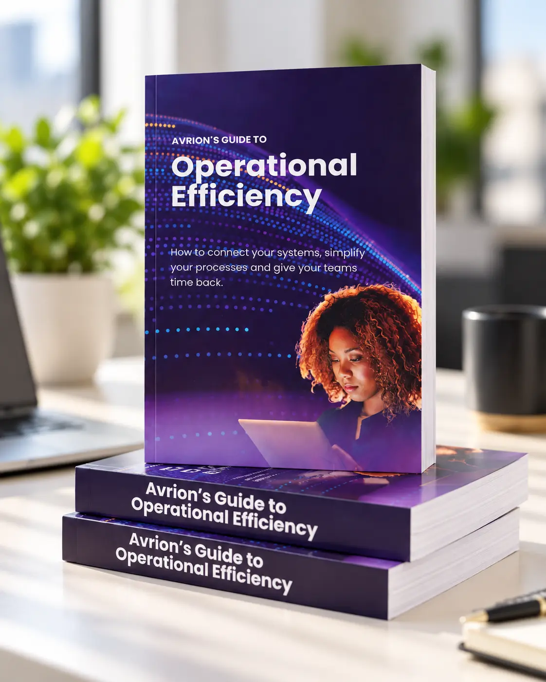 Avrion's Guide to Operational Efficiency, printed copies on a desk